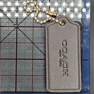 Coach Silver Leather Tag